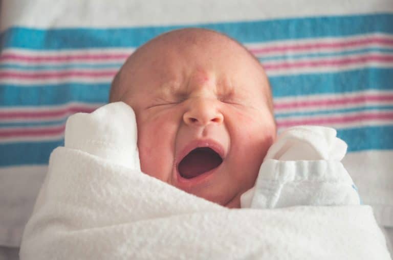 Newborn baby yawning