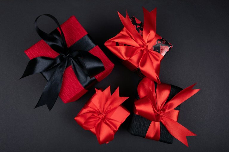 Gift wrapped with a red ribbon