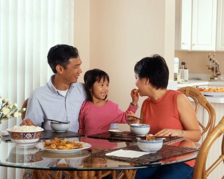 Extended family eating together at the table