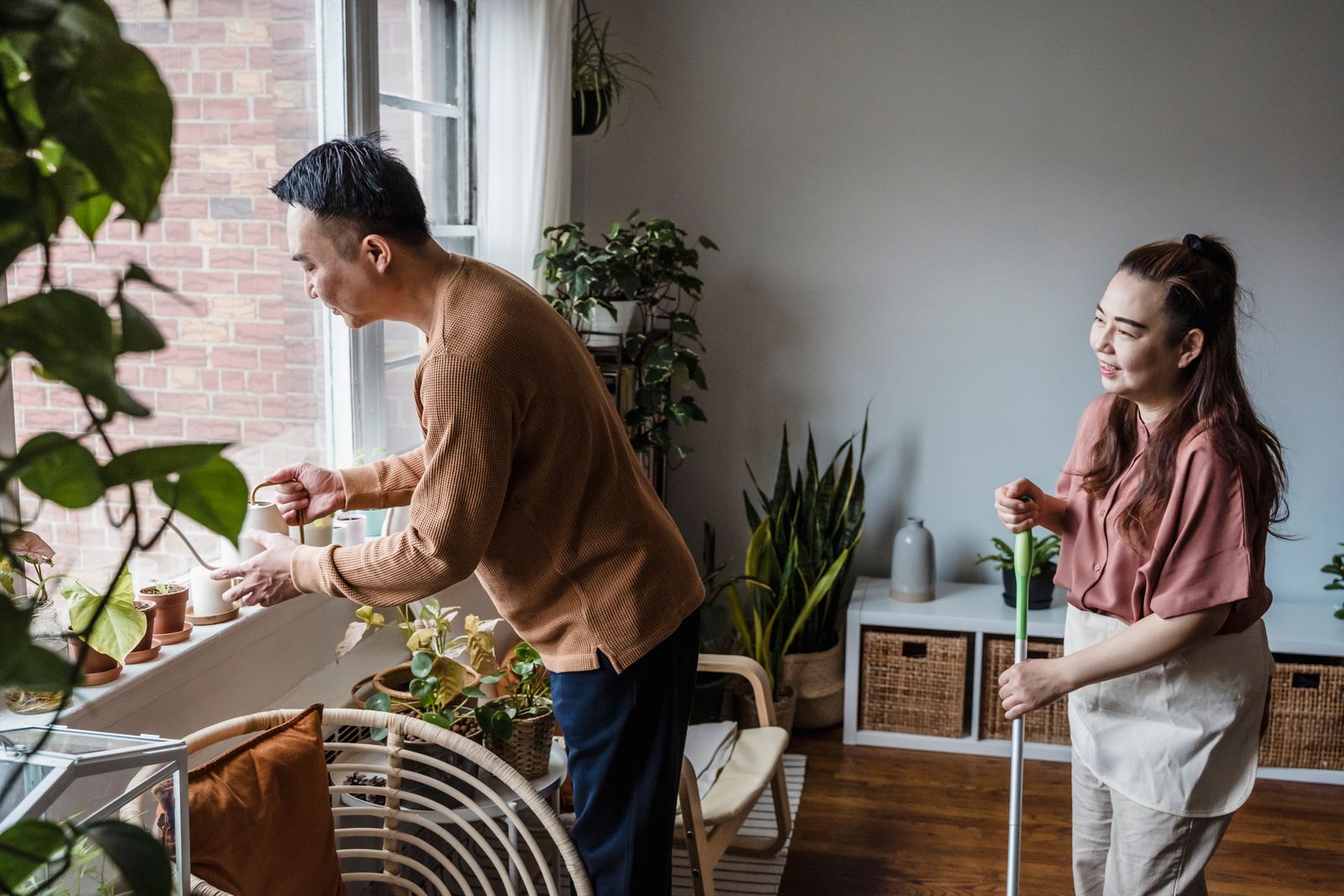 Couple splitting household chores together