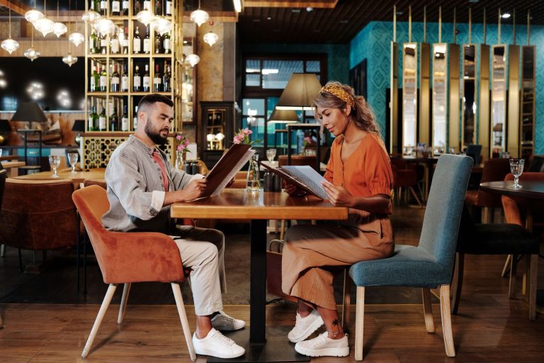 Couple trying to decide what to have for dinner